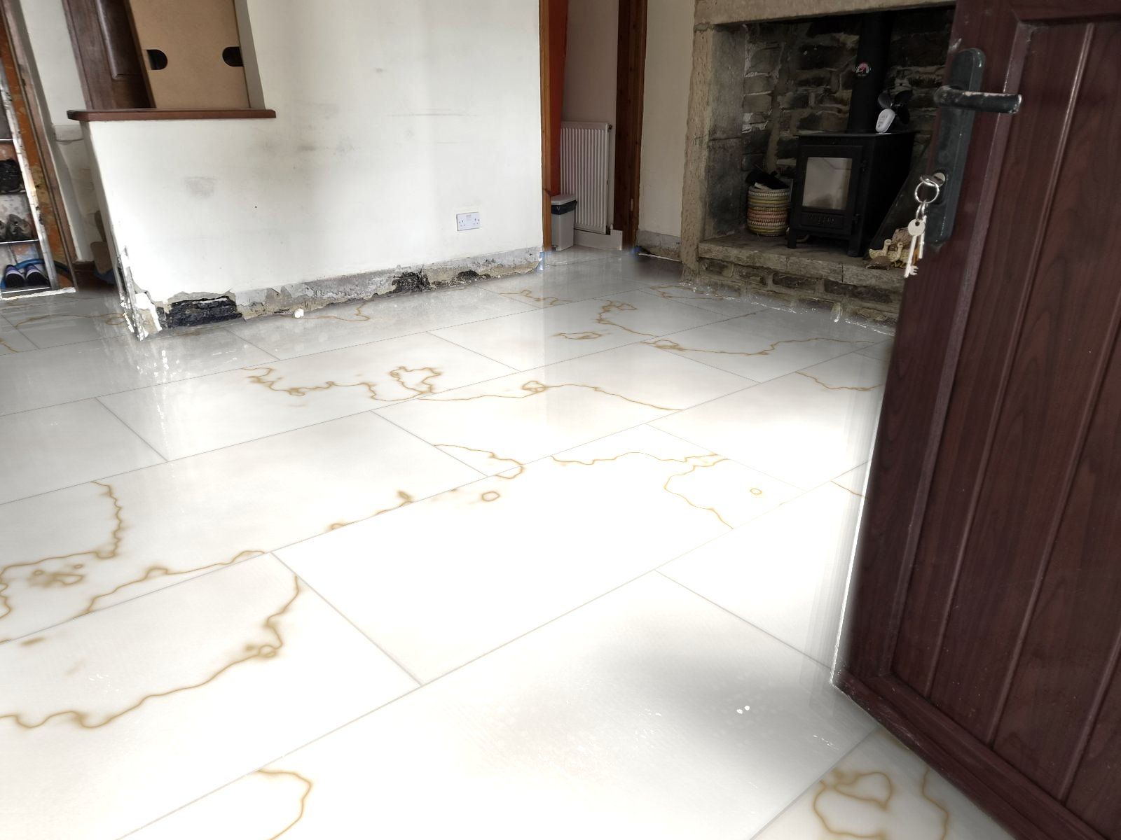 Large format marble-effect floor tiles