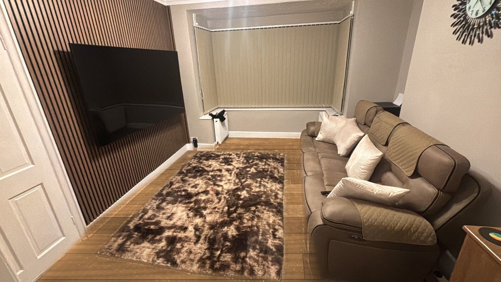 Natural oak wide planks in a media room